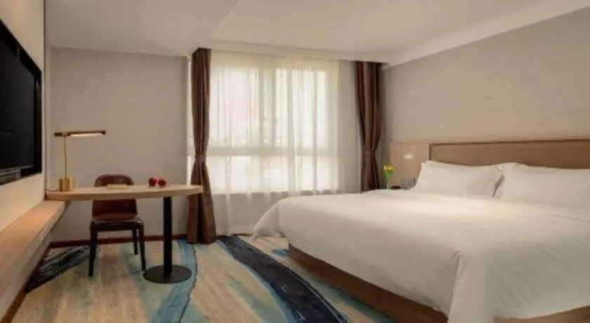 Bed in GreenTree Inn Ganzhou Sankang Temple DaRunFa Express Hotel