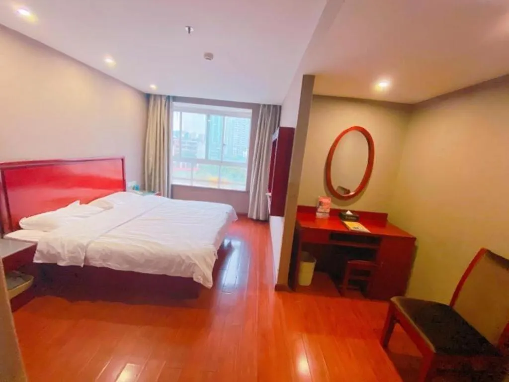 Bed in GreenTree Inn Ganzhou Sankang Temple DaRunFa Express Hotel