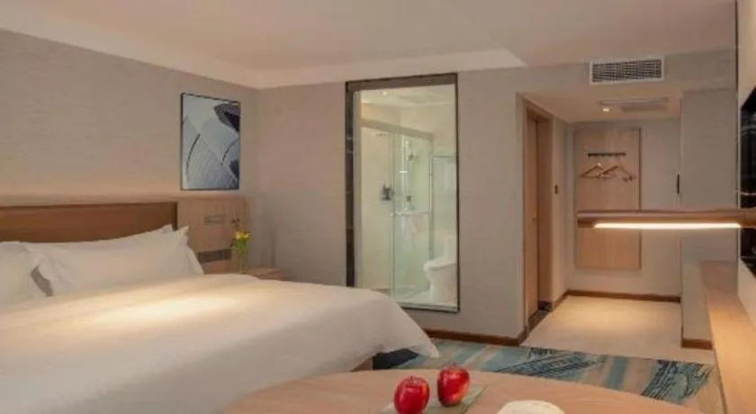 Bed in GreenTree Inn Ganzhou Sankang Temple DaRunFa Express Hotel