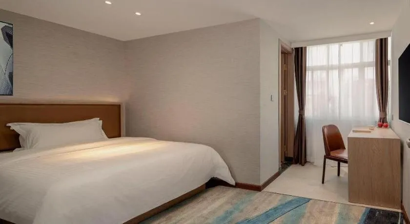 Bed in GreenTree Inn Ganzhou Sankang Temple DaRunFa Express Hotel