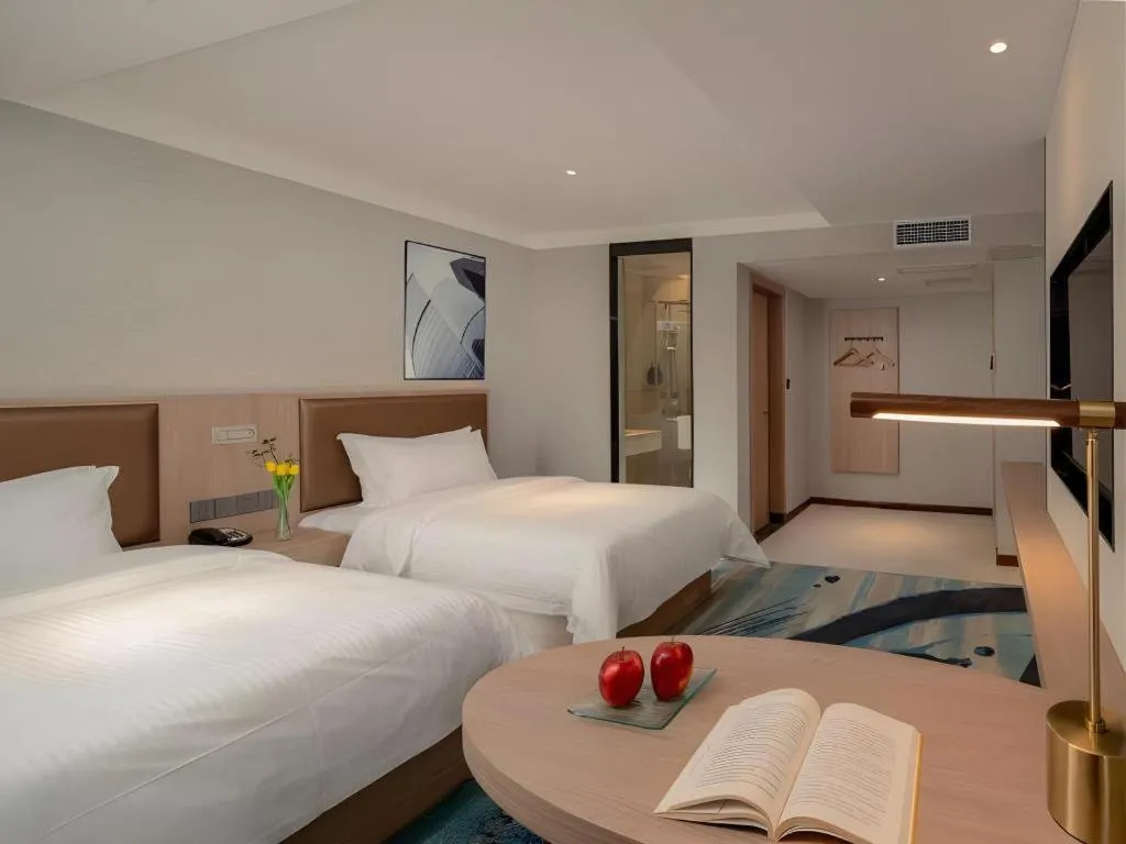 Bed in GreenTree Inn Ganzhou Sankang Temple DaRunFa Express Hotel