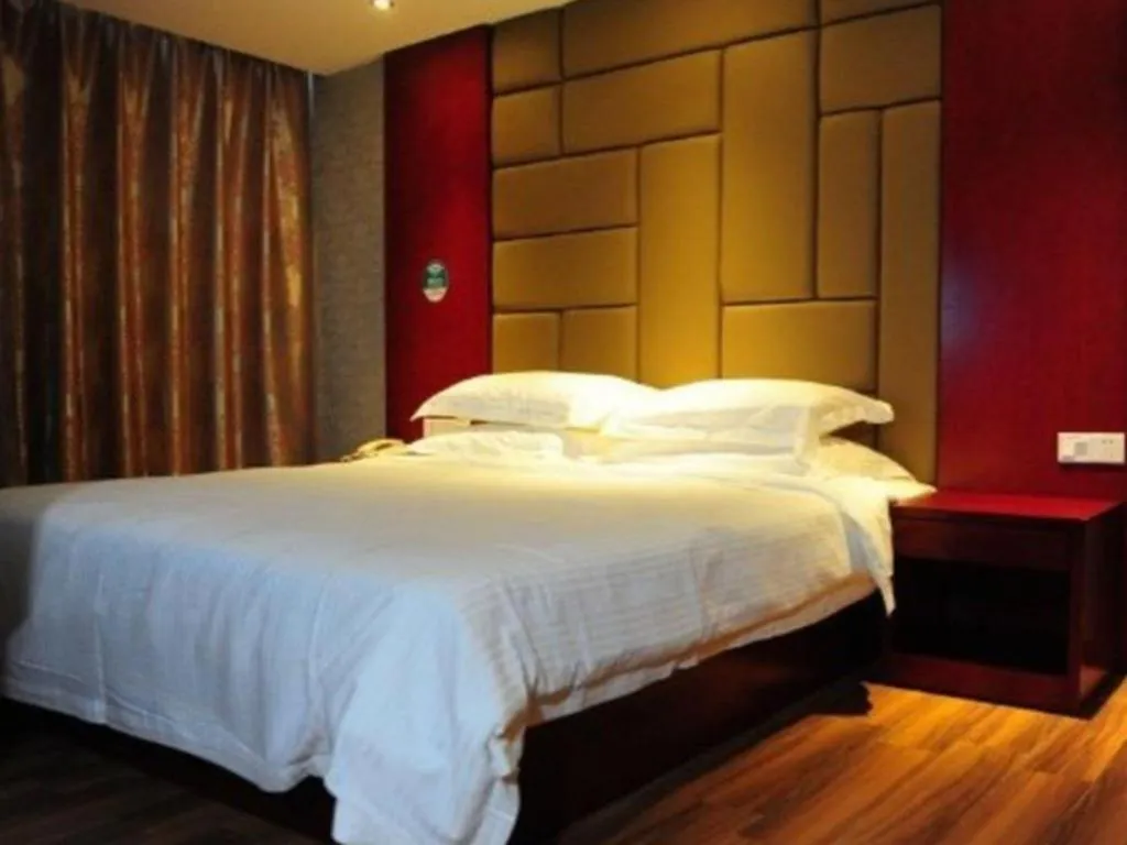 Bed in GreenTree Inn Ganzhou Sankang Temple DaRunFa Express Hotel