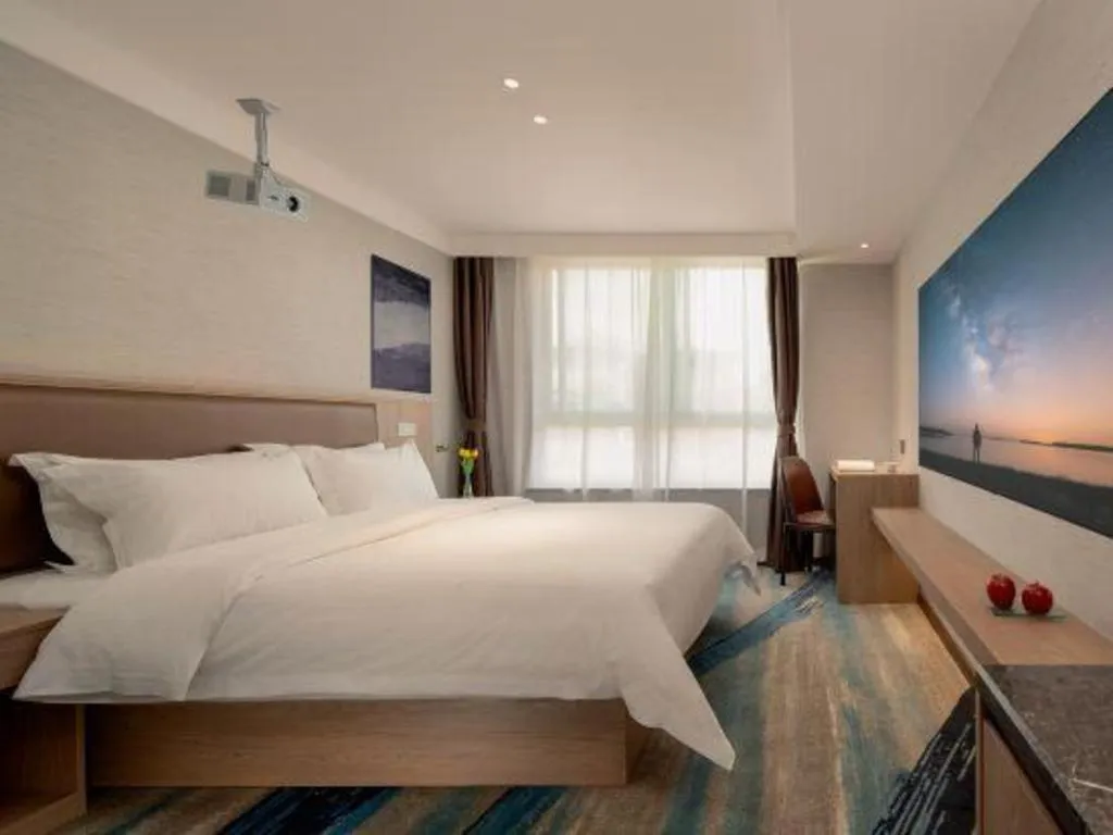 Bed in GreenTree Inn Ganzhou Sankang Temple DaRunFa Express Hotel