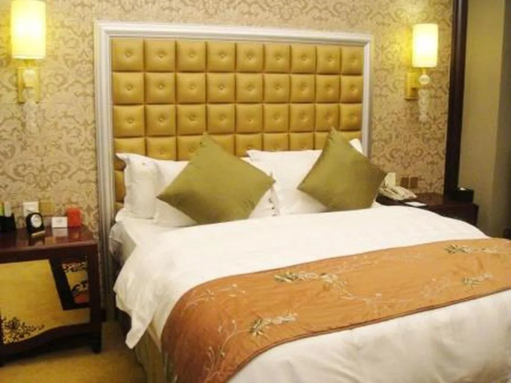 Bed in Shenyang Royal Wan Xin Hotel