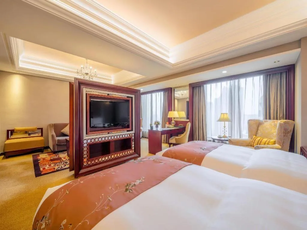 Bed in Shenyang Royal Wan Xin Hotel