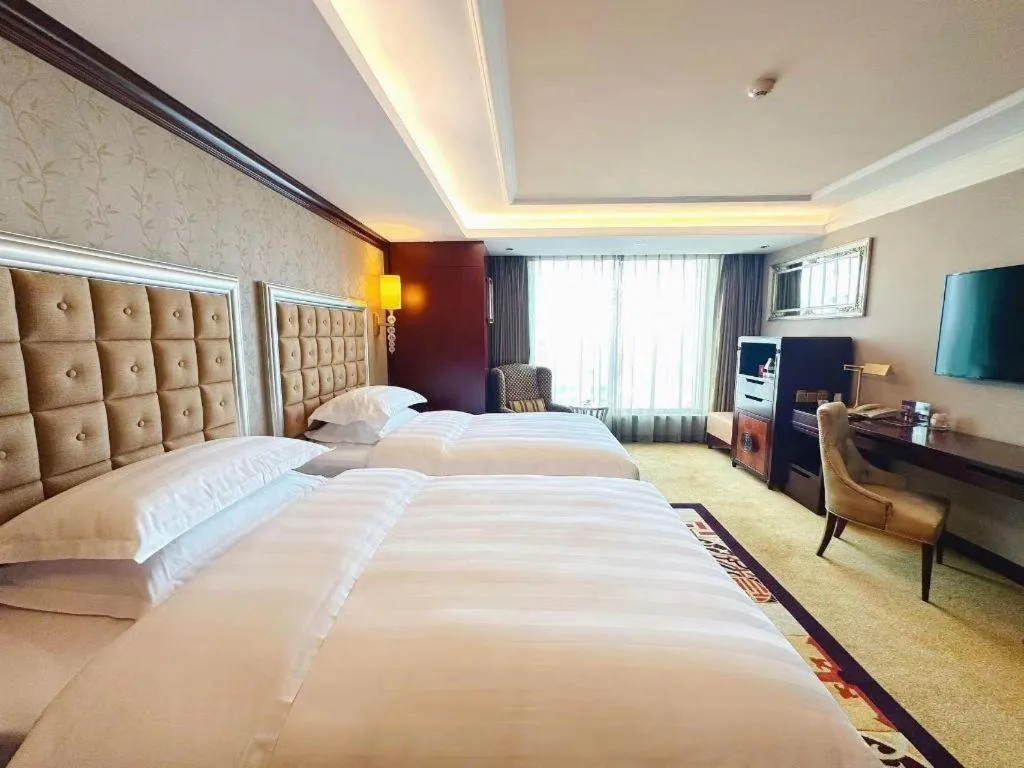 Bed in Shenyang Royal Wan Xin Hotel