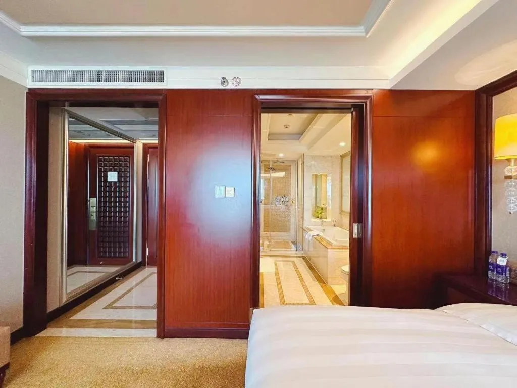 Bed in Shenyang Royal Wan Xin Hotel