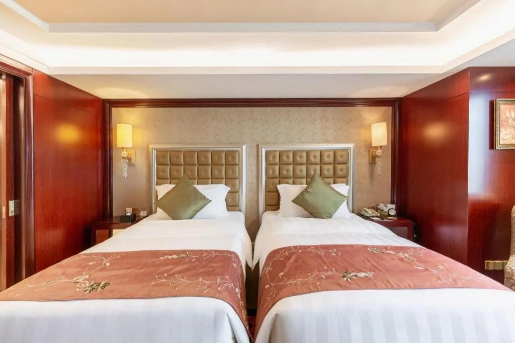 Bed in Shenyang Royal Wan Xin Hotel