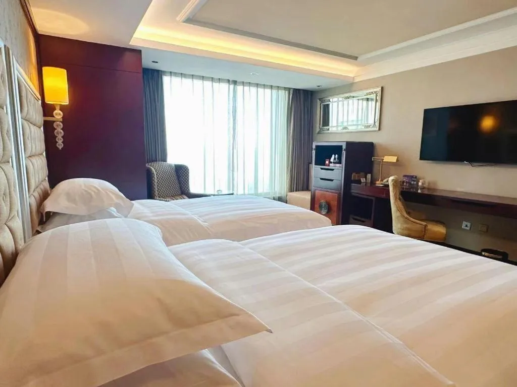 Bed in Shenyang Royal Wan Xin Hotel