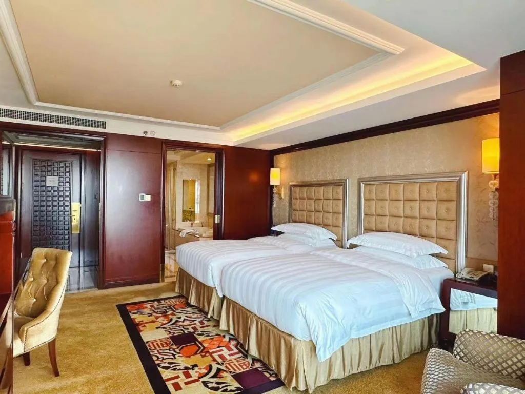 Bed in Shenyang Royal Wan Xin Hotel
