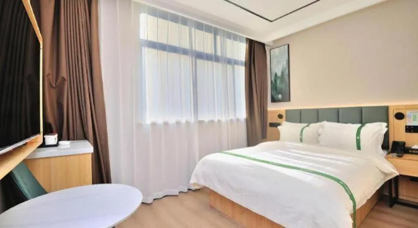 Bed in GreenTree Inn Suzhou Shihu Suli Road Express Hotel