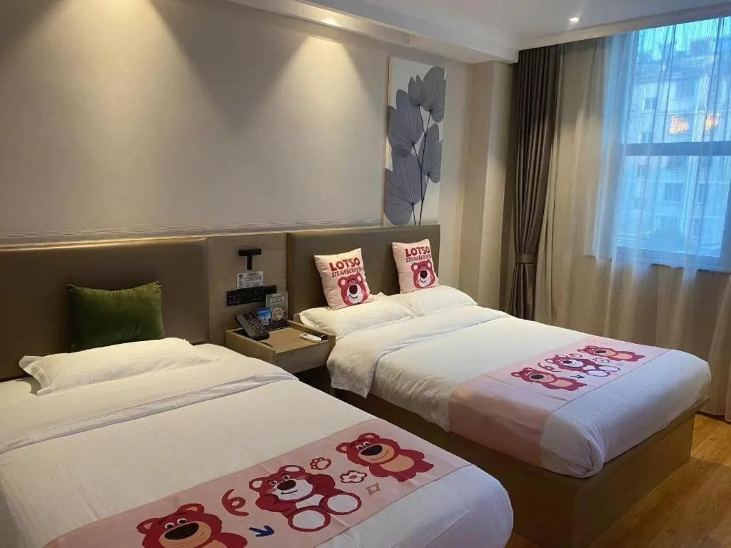 Bed in GreenTree Inn Xuzhou High Speed Railway Station Express Hotel