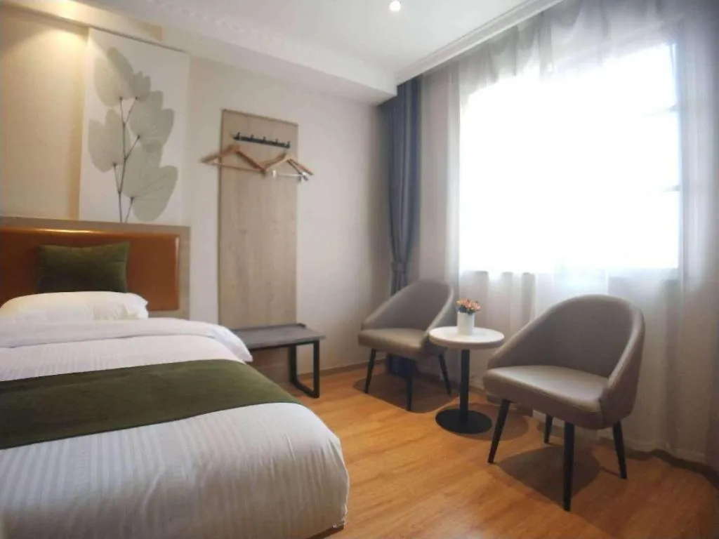 Bed in GreenTree Inn Xuzhou High Speed Railway Station Express Hotel
