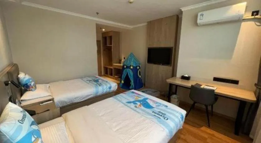 Bed in GreenTree Inn Xuzhou High Speed Railway Station Express Hotel