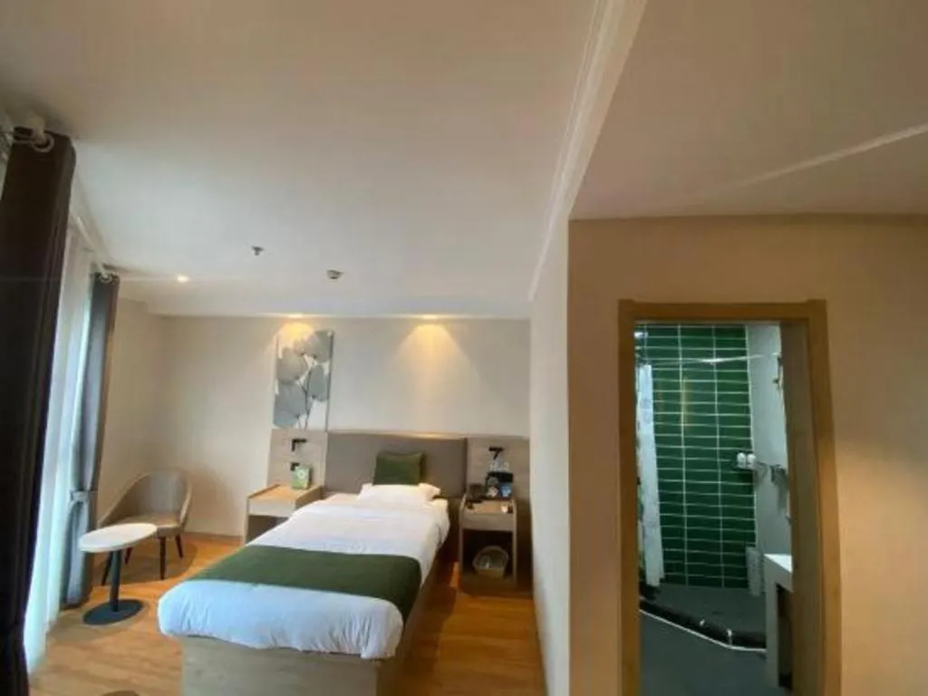 Bed in GreenTree Inn Xuzhou High Speed Railway Station Express Hotel