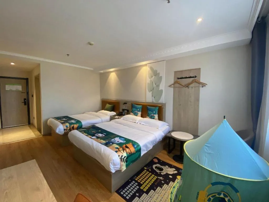 Bed in GreenTree Inn Xuzhou High Speed Railway Station Express Hotel