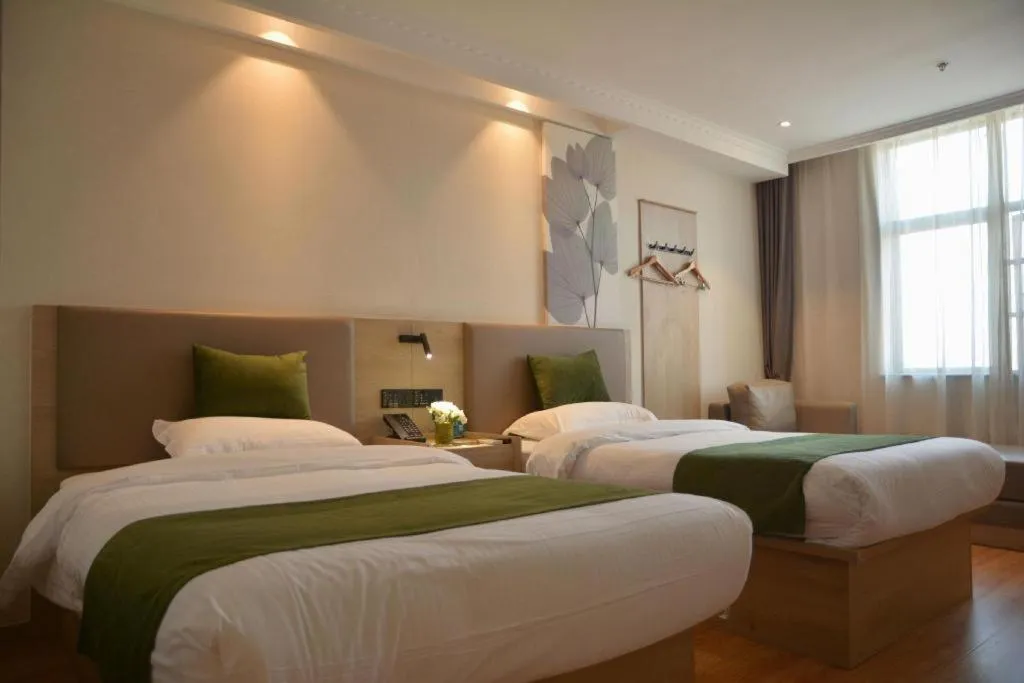Bed in GreenTree Inn Xuzhou High Speed Railway Station Express Hotel