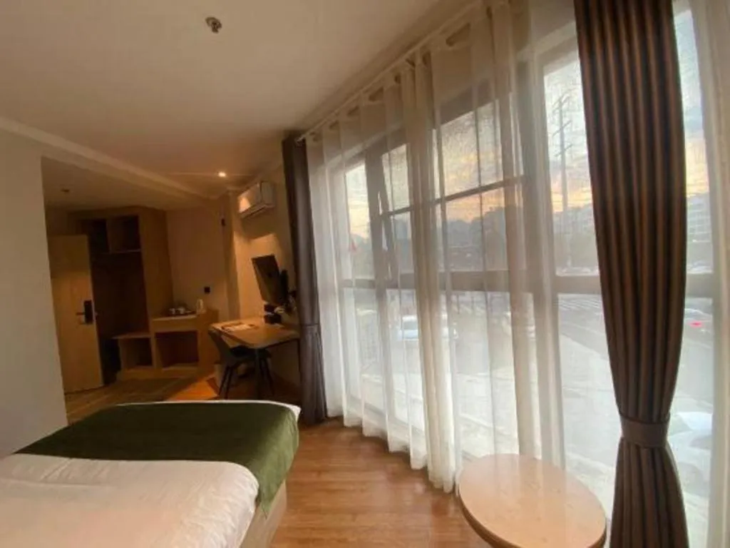 Bed in GreenTree Inn Xuzhou High Speed Railway Station Express Hotel