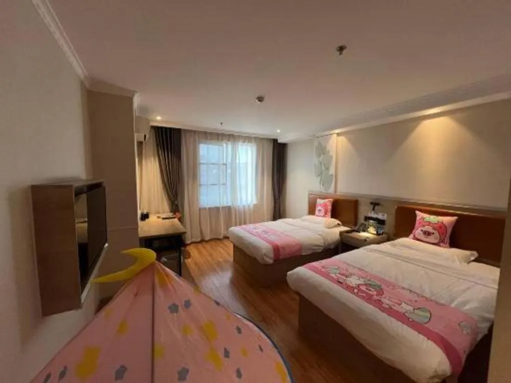 Bed in GreenTree Inn Xuzhou High Speed Railway Station Express Hotel