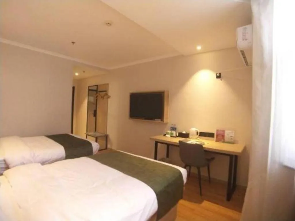 Bed in GreenTree Inn Xuzhou High Speed Railway Station Express Hotel