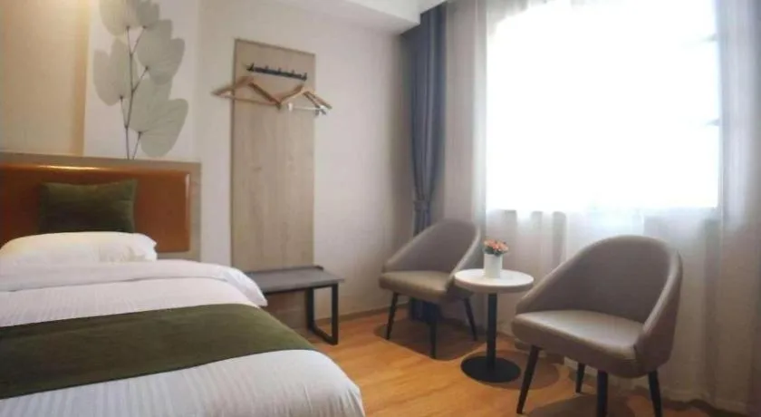 Bed in GreenTree Inn Xuzhou High Speed Railway Station Express Hotel