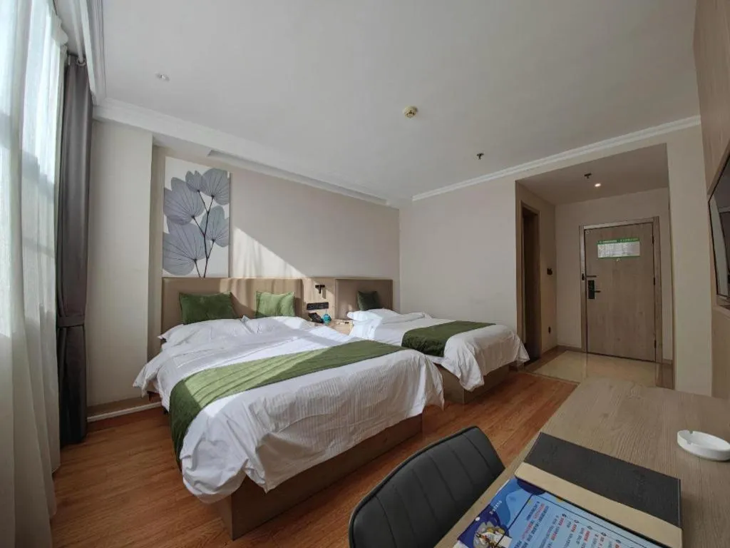 Bed in GreenTree Inn Xuzhou High Speed Railway Station Express Hotel