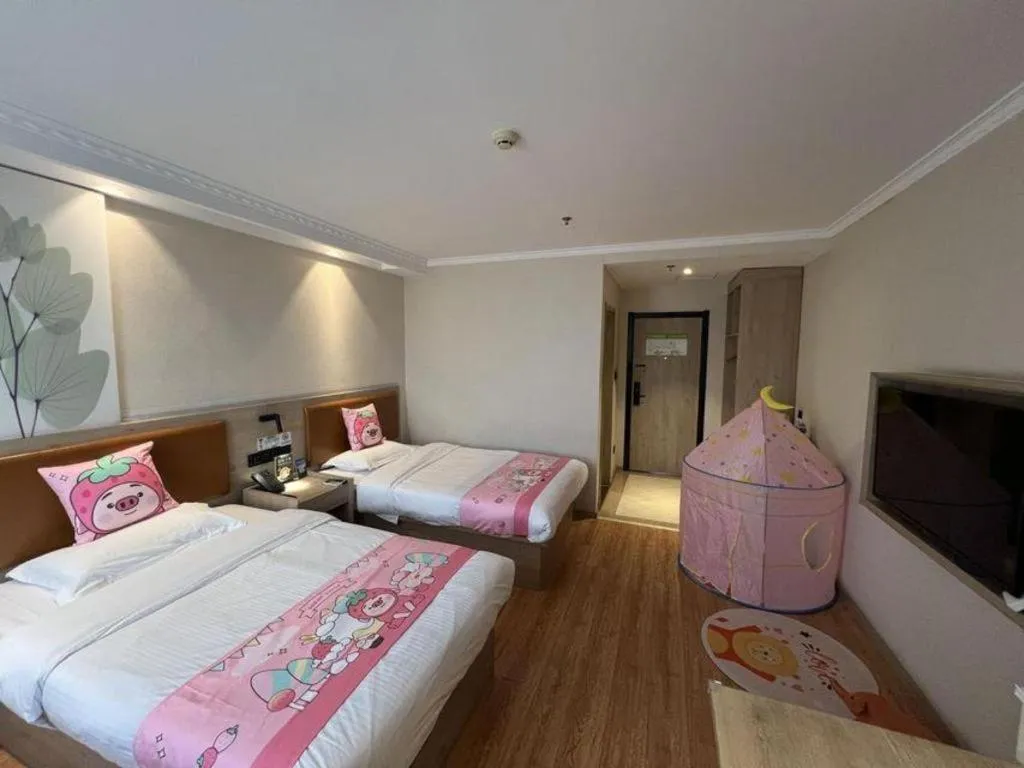 Bed in GreenTree Inn Xuzhou High Speed Railway Station Express Hotel