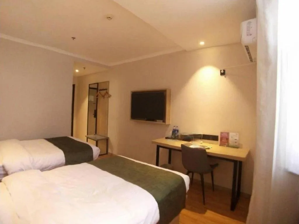 Bed in GreenTree Inn Xuzhou High Speed Railway Station Express Hotel