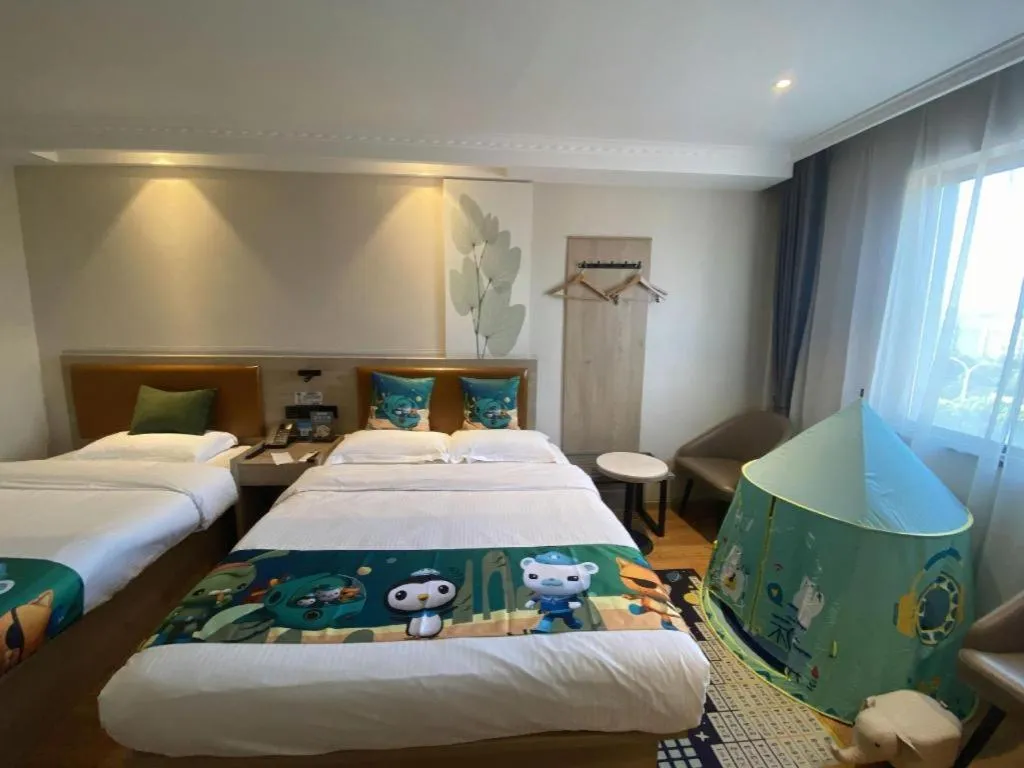 Bed in GreenTree Inn Xuzhou High Speed Railway Station Express Hotel