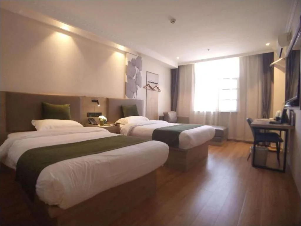 Bed in GreenTree Inn Xuzhou High Speed Railway Station Express Hotel