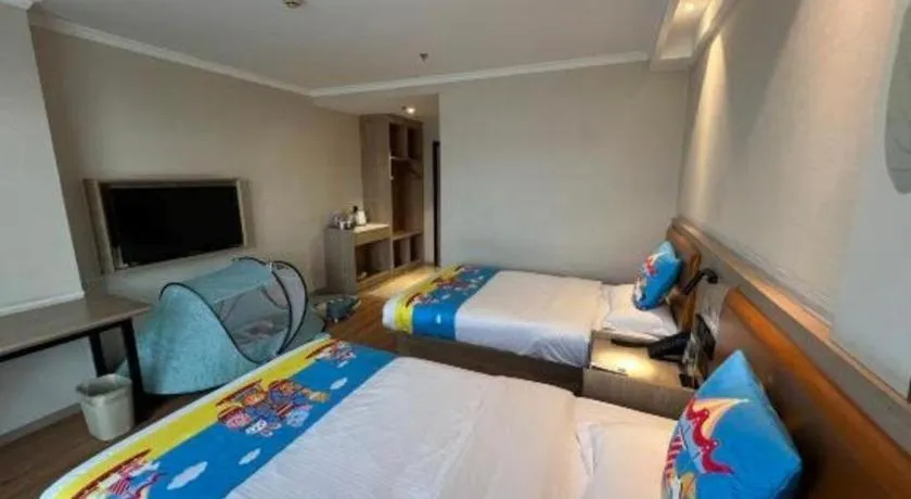 Bed in GreenTree Inn Xuzhou High Speed Railway Station Express Hotel