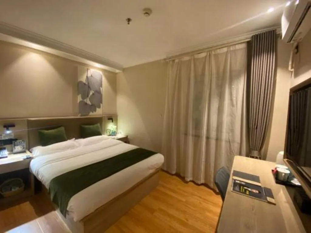 Bed in GreenTree Inn Xuzhou High Speed Railway Station Express Hotel