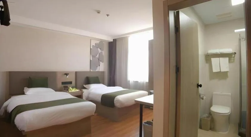 Bed in GreenTree Inn Xuzhou High Speed Railway Station Express Hotel