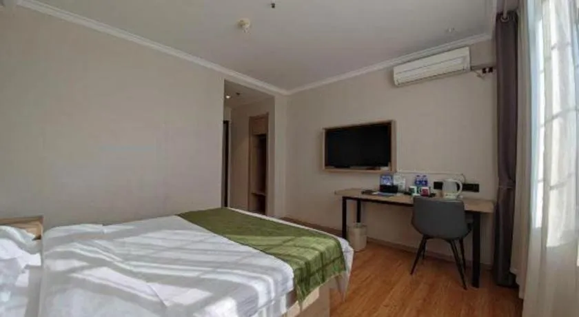 Bed in GreenTree Inn Xuzhou High Speed Railway Station Express Hotel