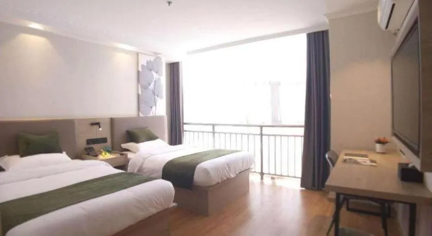 Bed in GreenTree Inn Xuzhou High Speed Railway Station Express Hotel