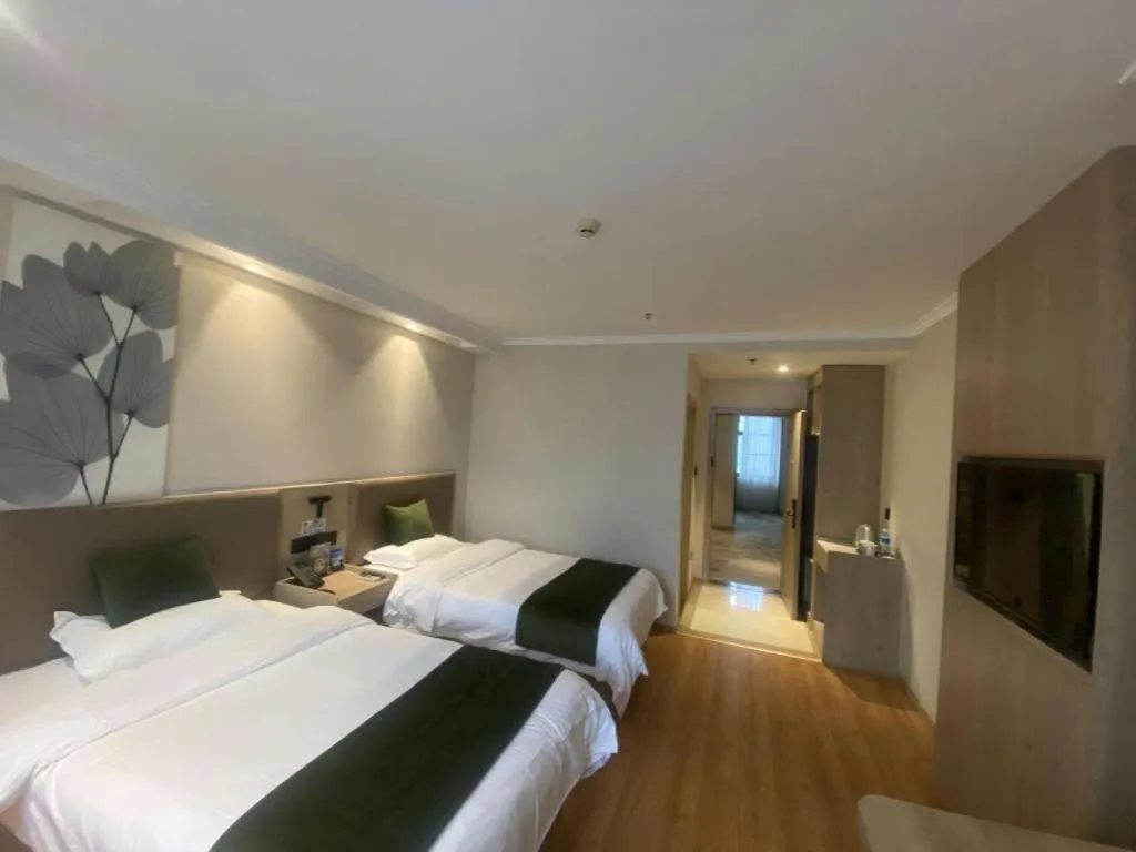 Bed in GreenTree Inn Xuzhou High Speed Railway Station Express Hotel