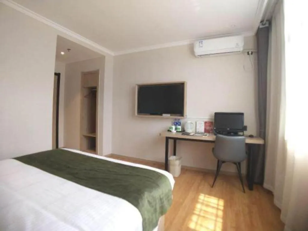 Bed in GreenTree Inn Xuzhou High Speed Railway Station Express Hotel