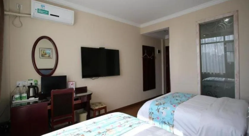 Bed in GreenTree Inn Jiangsu Wuxi Xishan DongTing Erquan East Road XinGuang Newly Estate Express Hotel