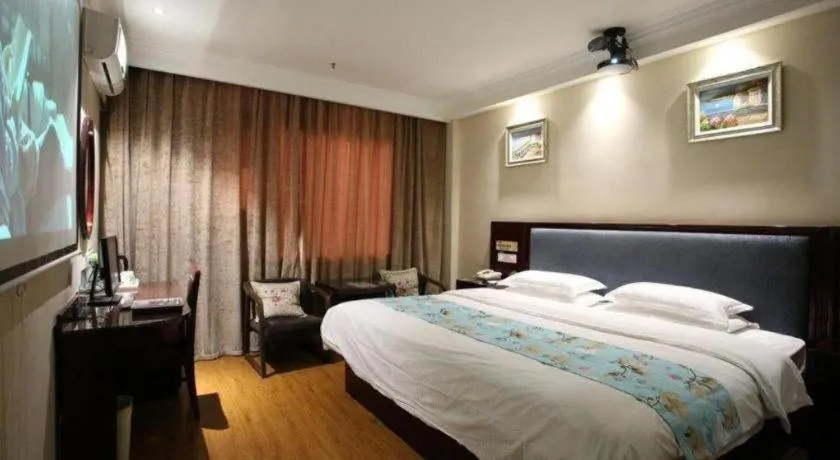 Bed in GreenTree Inn Jiangsu Wuxi Xishan DongTing Erquan East Road XinGuang Newly Estate Express Hotel