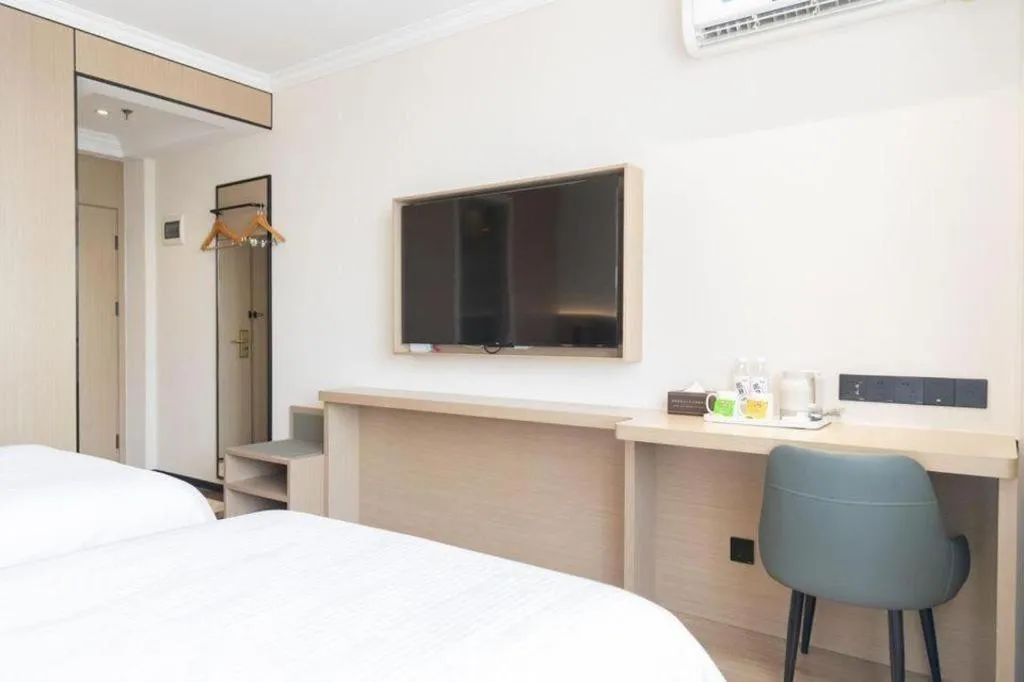 Bed in GreenTree Inn Jiangsu Wuxi Xishan DongTing Erquan East Road XinGuang Newly Estate Express Hotel