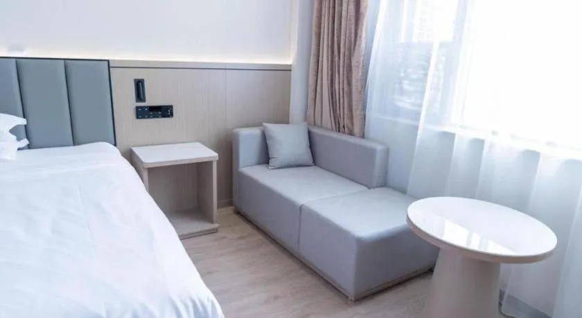 Bed in GreenTree Inn Jiangsu Wuxi Xishan DongTing Erquan East Road XinGuang Newly Estate Express Hotel