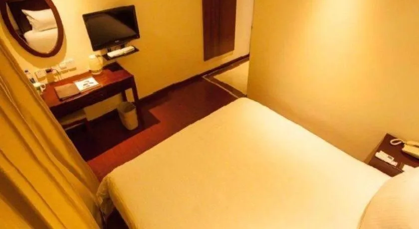 Bed in GreenTree Inn Nanjing Software Valley DaDingFang Express Hotel