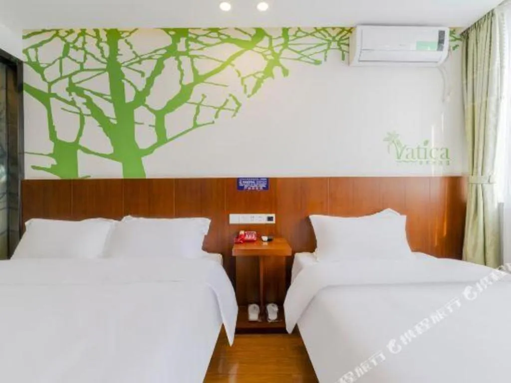 Bed in Vatica ShangHai Pudong Airport Disney Huaxia(E) Road Metro Station Hotel .