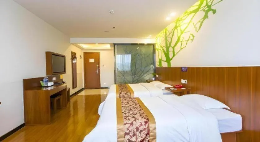 Bed in Vatica ShangHai Pudong Airport Disney Huaxia(E) Road Metro Station Hotel .