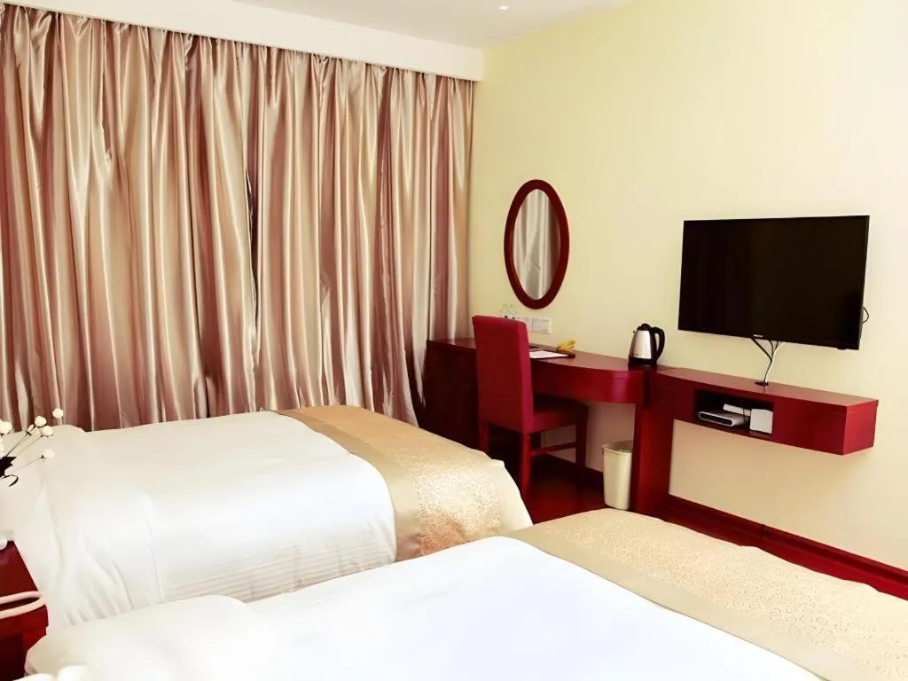 Bed in GreenTree Inn Nanjing Dachang Getang Metro Station Express Hotel