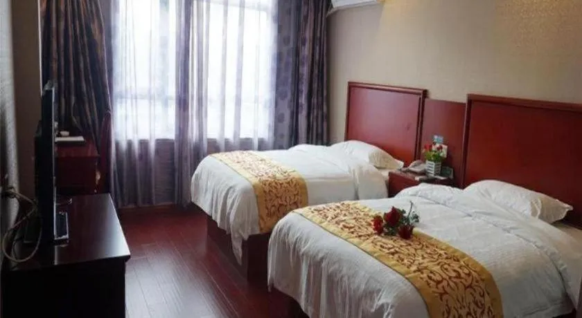 Bed in GreenTree Inn Nanjing Dachang Getang Metro Station Express Hotel