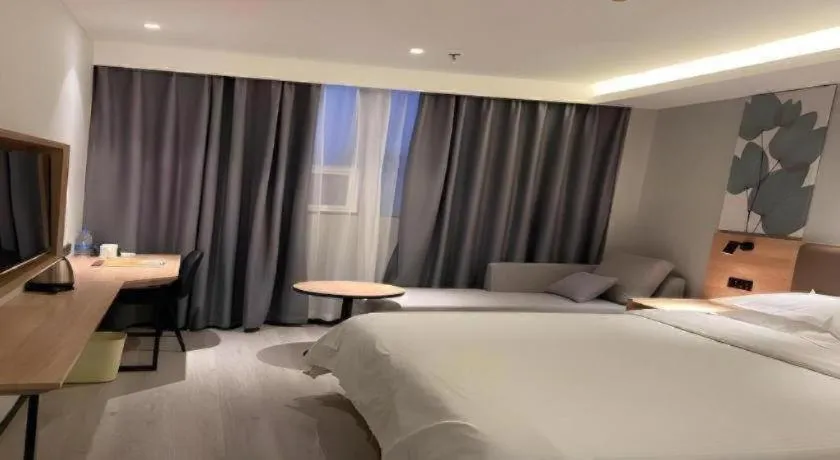 Bed in GreenTree Inn Nanjing Dachang Getang Metro Station Express Hotel