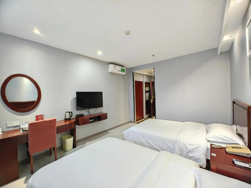 Bed in GreenTree Inn Nanjing Dachang Getang Metro Station Express Hotel