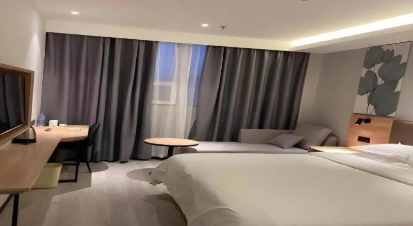 Bed in GreenTree Inn Nanjing Dachang Getang Metro Station Express Hotel