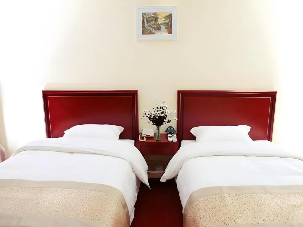 Bed in GreenTree Inn Nanjing Dachang Getang Metro Station Express Hotel